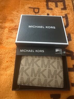 Michael Kors Men’s Beige Monogram Bi-Fold Wallet
